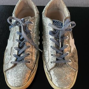 Golden Goose Superstars in silver glitter with white star. Women’s size 40